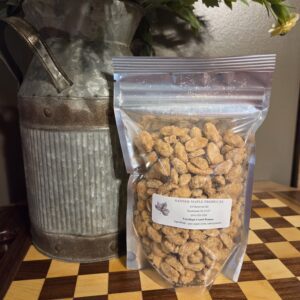 Bag of candied nuts on wooden checkerboard