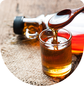 Syrup bottle and filled glass