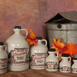 Assorted maple syrup jars and bucket